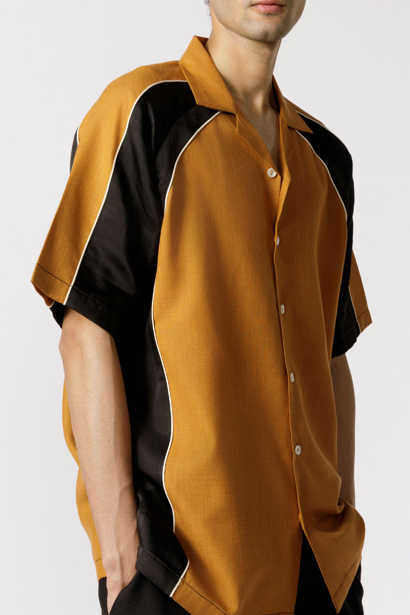 Arched cut and sew resort shirt