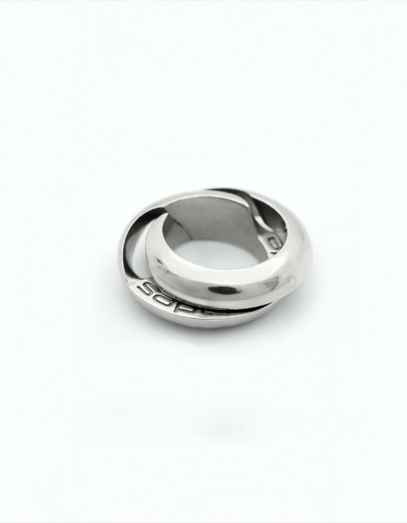 Two-piece silver ring with internal engraving, half open