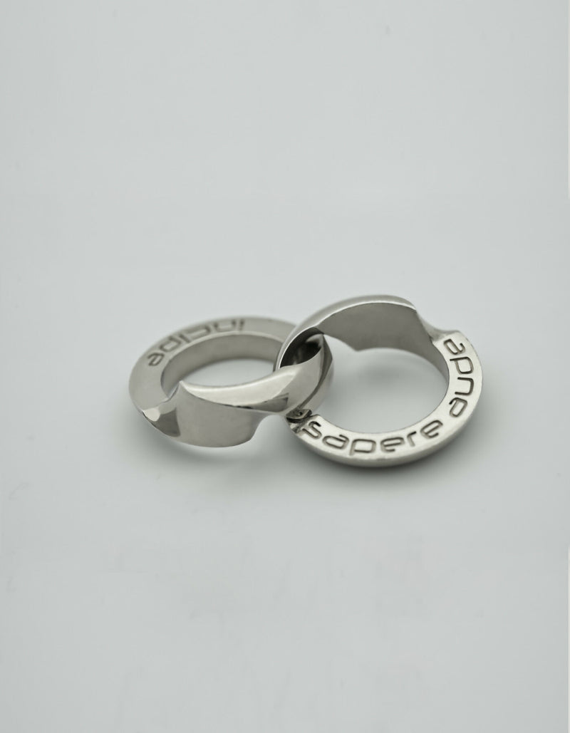 Two-piece silver ring with individual engraving on the hidden inner surfaces