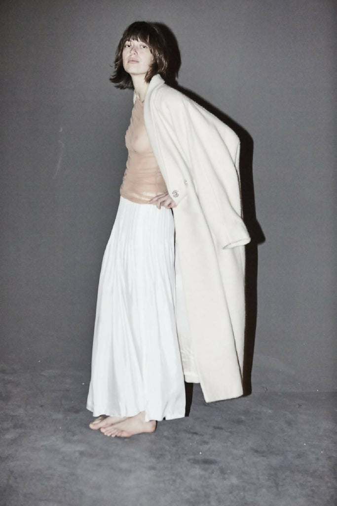 UMAN WHITE PLEATED SKIRT