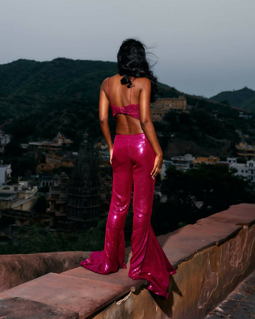 GET DOWN ON IT SEQUIN FLARE TROUSER IN PINK