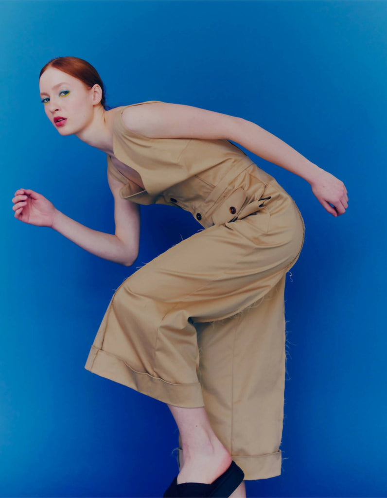 Beige jumpsuit with turned-up legs