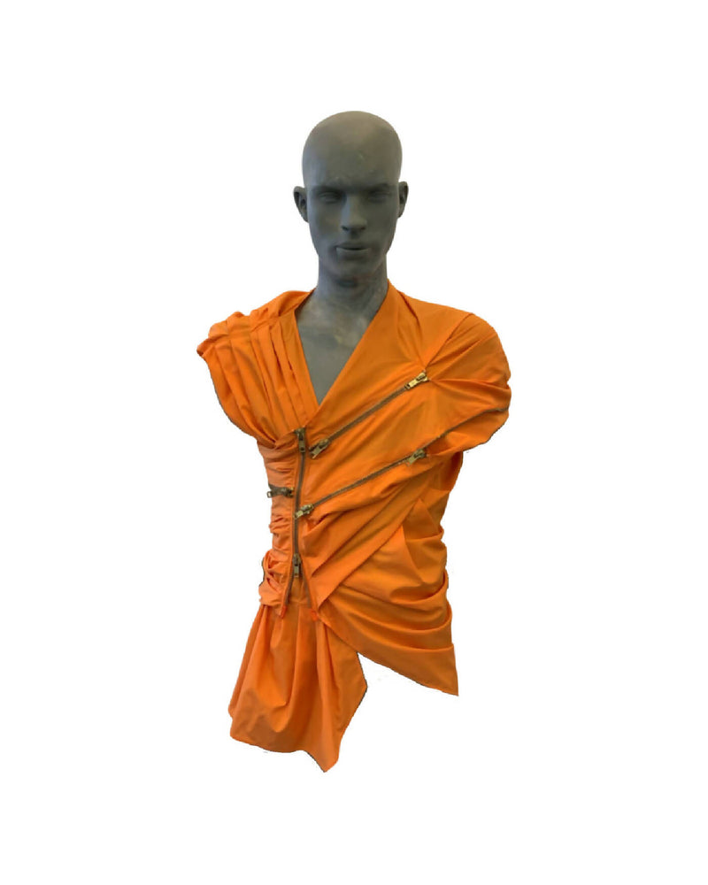 A draped sleeveless shirt.